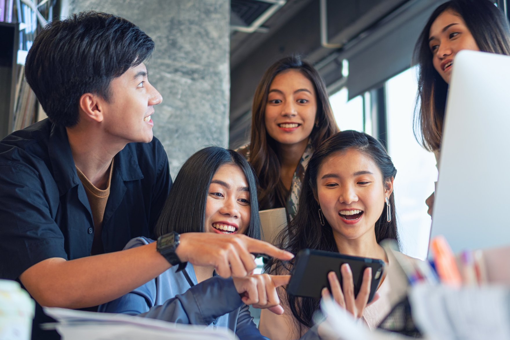 Young asian business team working in office